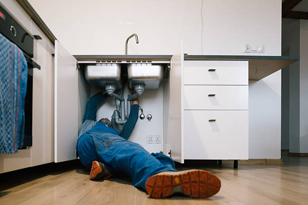 Professional Emergency Plumber technician working in Westford, MA